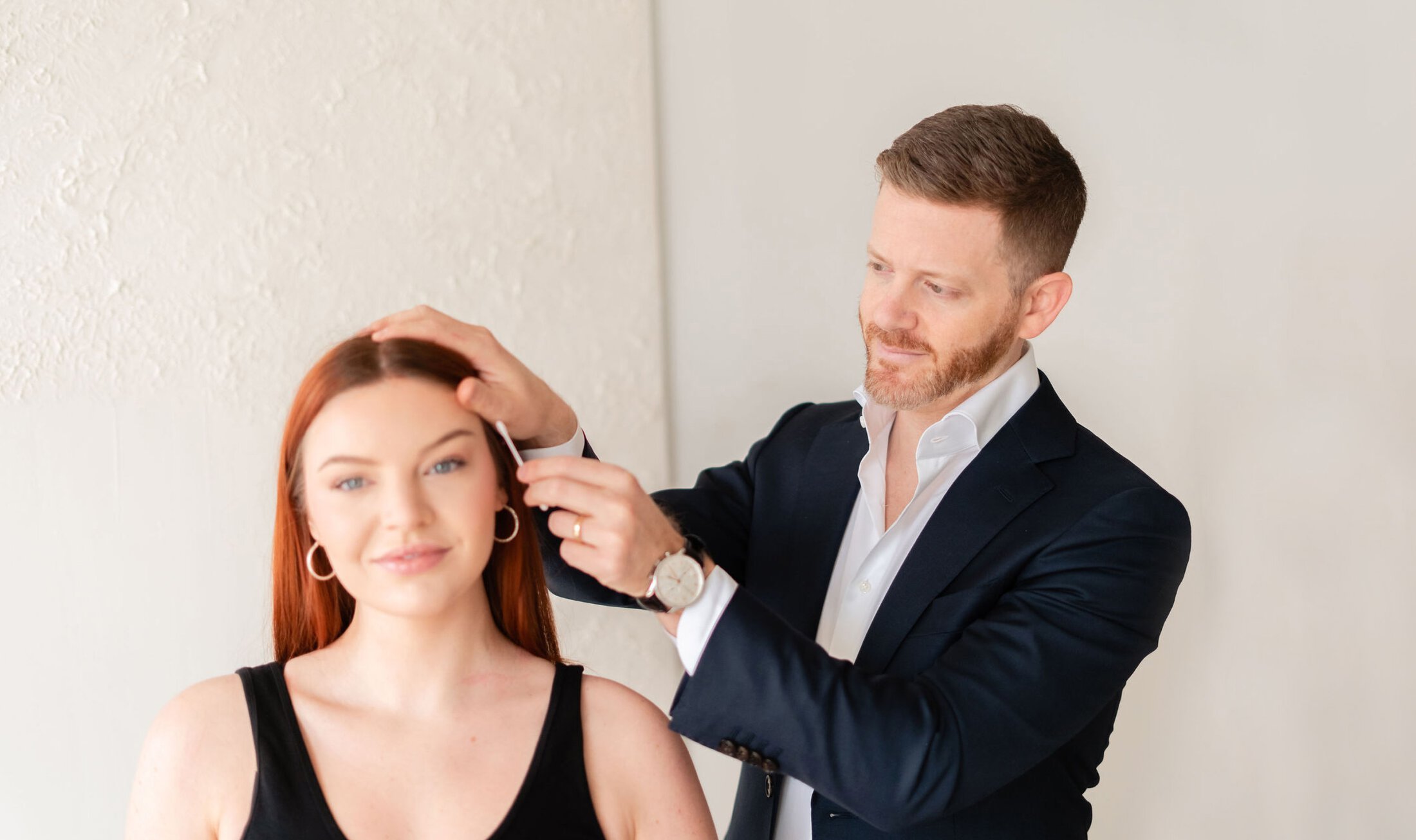 Toronto Facial Plastic Surgeon Dr Mike Roskies with model with red hair